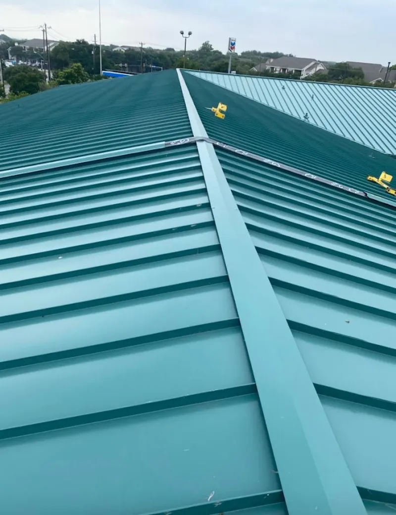Green commercial metal roof ridge and valley for Metal Roof Repair in Mill Creek