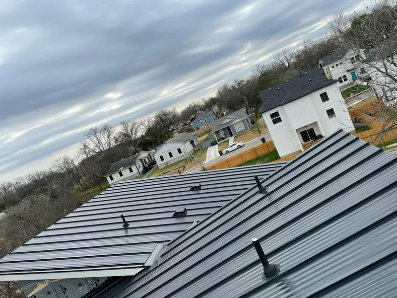 Standing seam metal roof panels with vents for Skylight Repair in Mill Creek